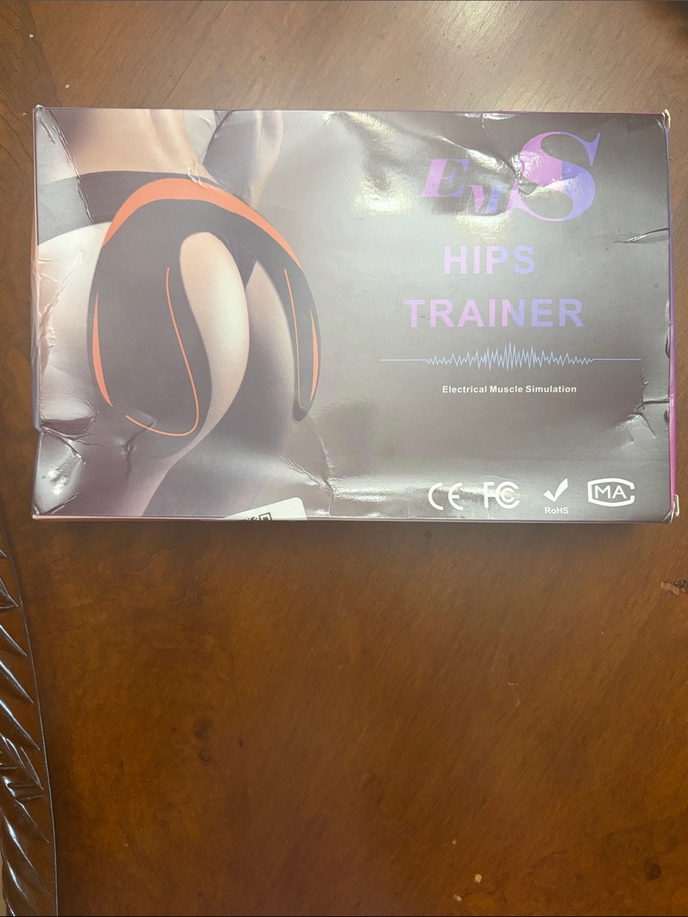 EMS Hips Trainer Electric Muscle Stimulation - Black & Orange
